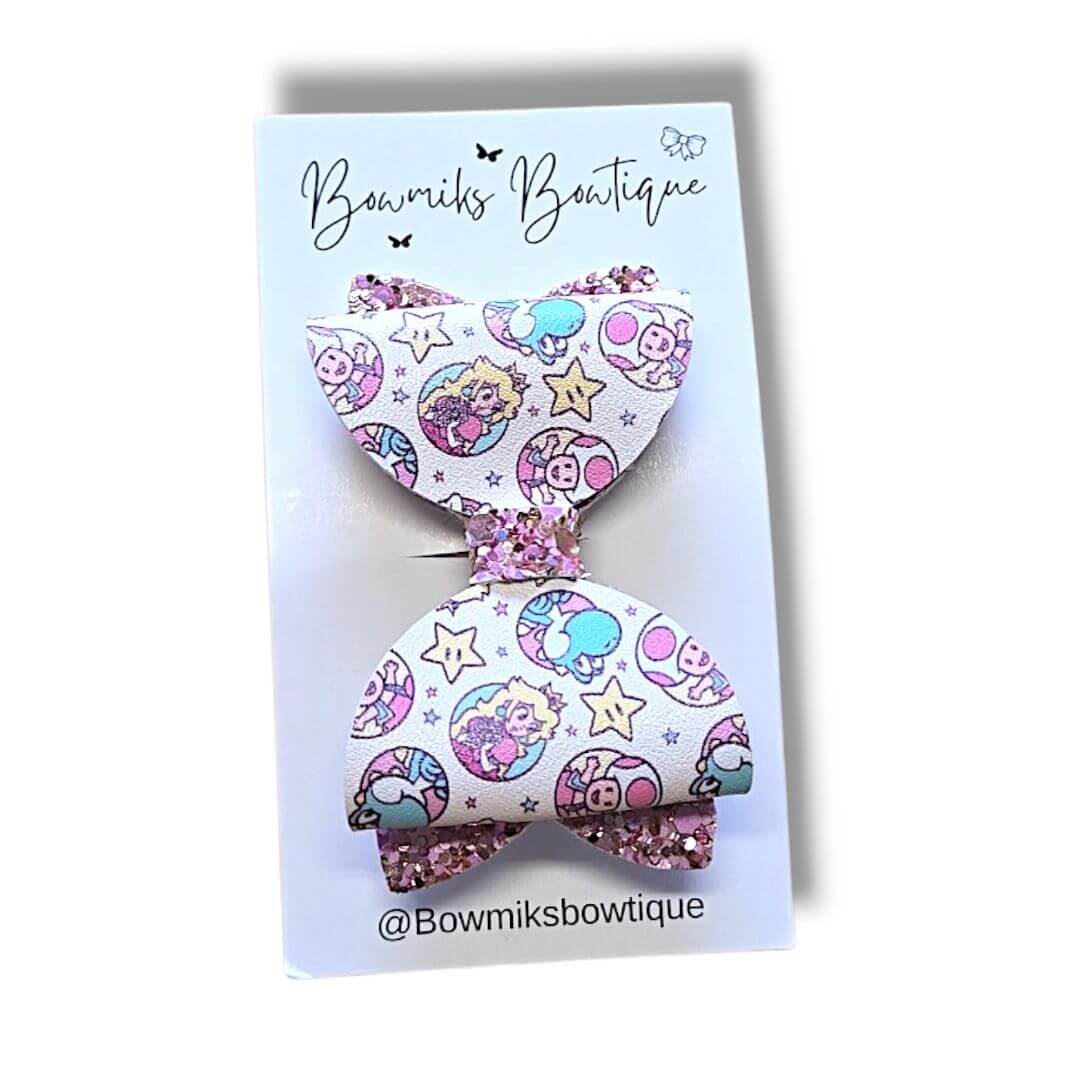Bowmiks Boutique hair accessory for kids featuring a colorful bow clip with charming designs.