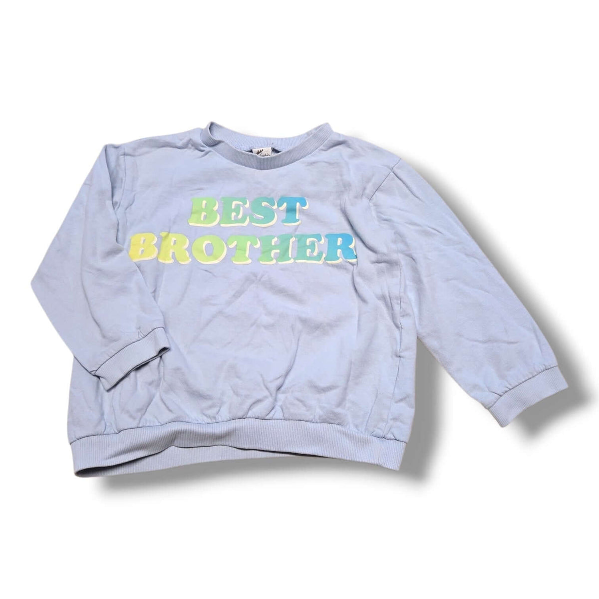 Pre-loved H&M toddler sweatshirt in light blue with "Best Brother" lettering for cozy wear.