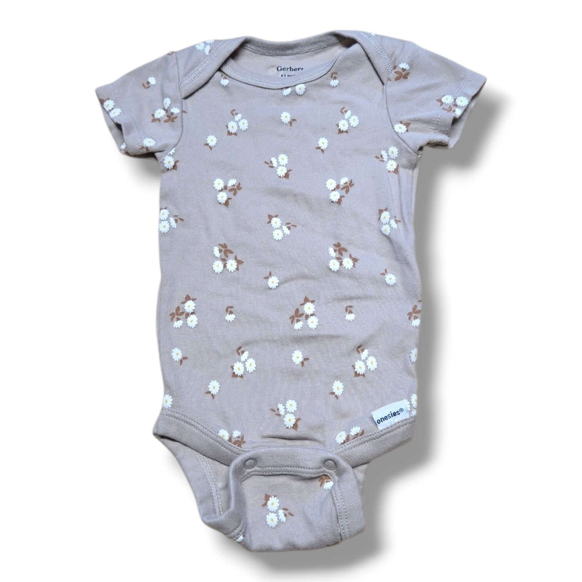 Gerber pre-loved baby onesie with floral print, perfect for layering and everyday wear.