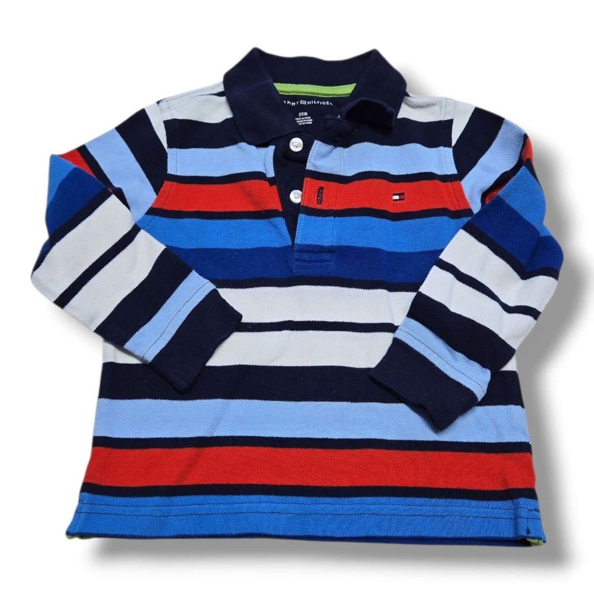 pre-loved Tommy Hilfiger polo 2T featuring bold navy, blue, white, and red stripes with a classic collar.