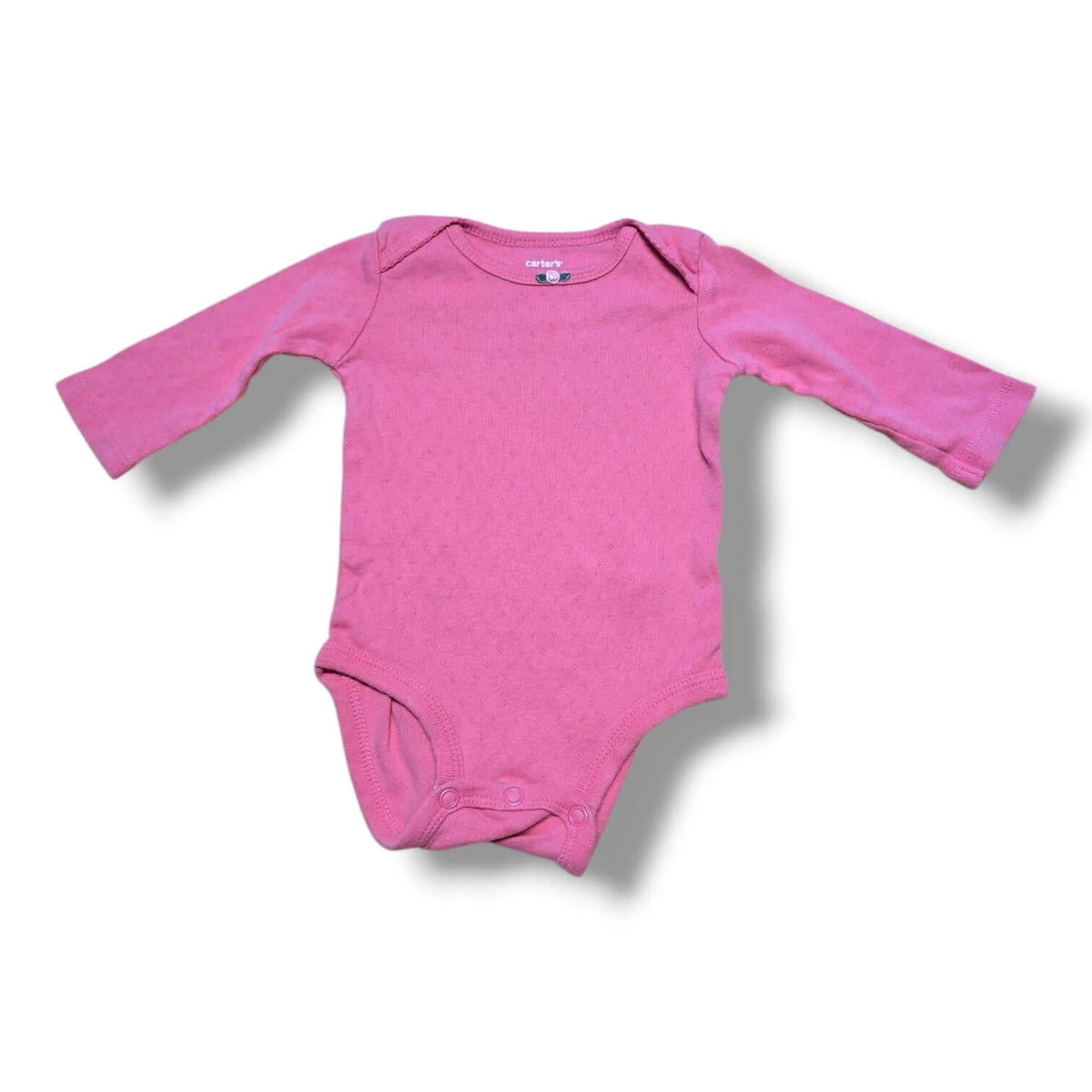 Pre-loved baby onesie in pink, soft and comfortable for everyday wear, featuring easy snap closures.