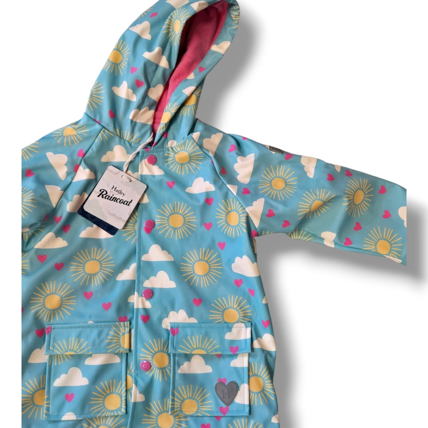 4T waterproof rain jacket for kids in sunny cloud print with soft pink lining by Hatley.