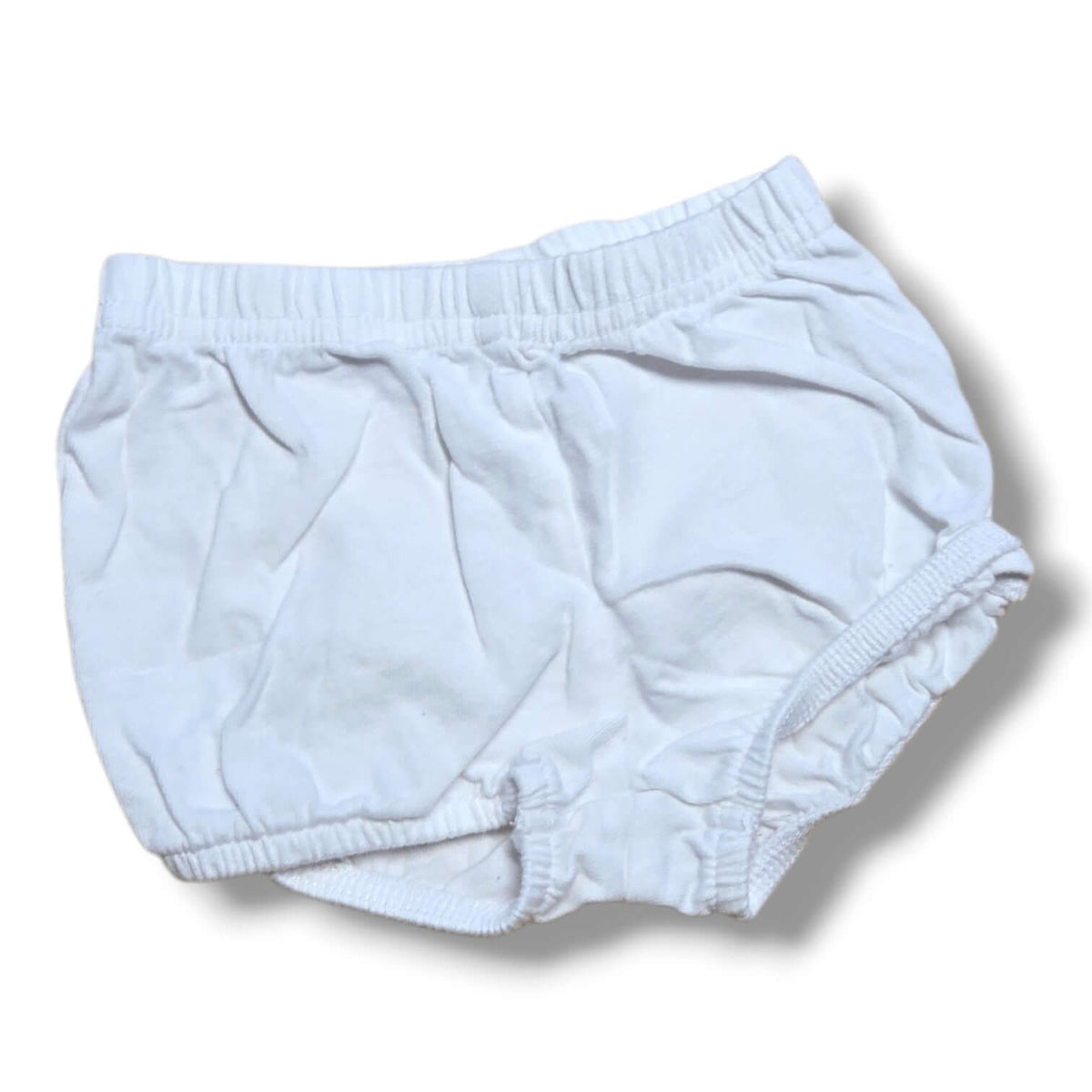 Preloved bloomers for infants in white, soft and comfortable, perfect for layering or warm days.