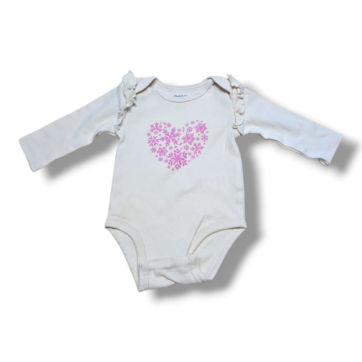 Preloved baby onesie with pink heart design and ruffle sleeves, perfect for everyday wear.