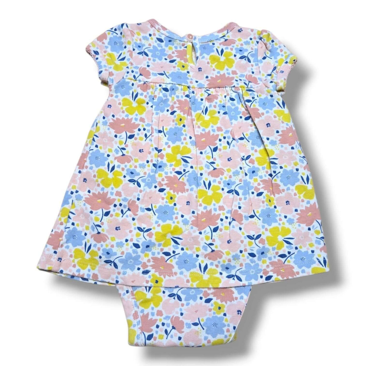 Pre-loved floral romper 3-6 months with pastel pink, yellow and blue floral print and bow detail.