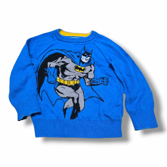 Pre-loved kids knit sweater in blue featuring Batman design for stylish and sustainable children's fashion.