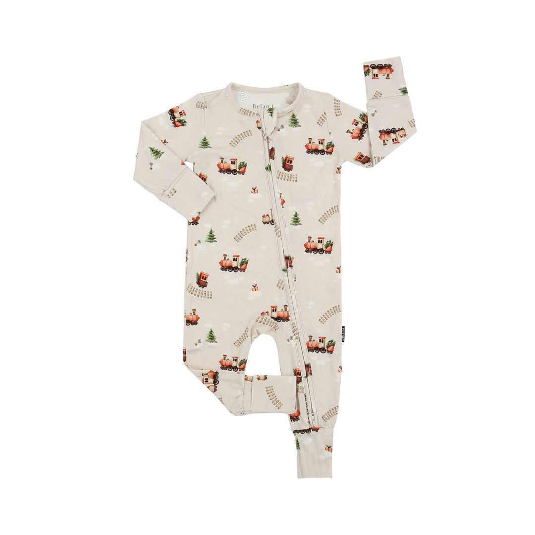 Holiday bamboo footless sleeper featuring a playful Christmas train print on a soft background.