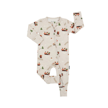 Holiday bamboo footless sleeper featuring a playful Christmas train print on a soft background.