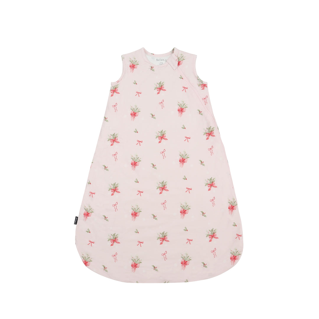 pink bows sleep sack for babies featuring a floral design with pink bows and a cozy shape.