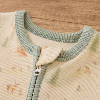 Close-up of Blara Organic House long-sleeve ribbed footie romper featuring organic cotton footie romper design.