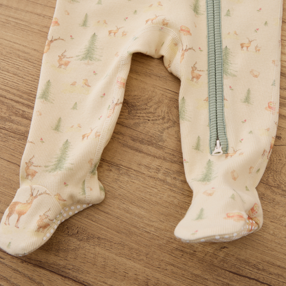 Close-up of Blara Organic House organic cotton footie romper with footies and zipper detail.