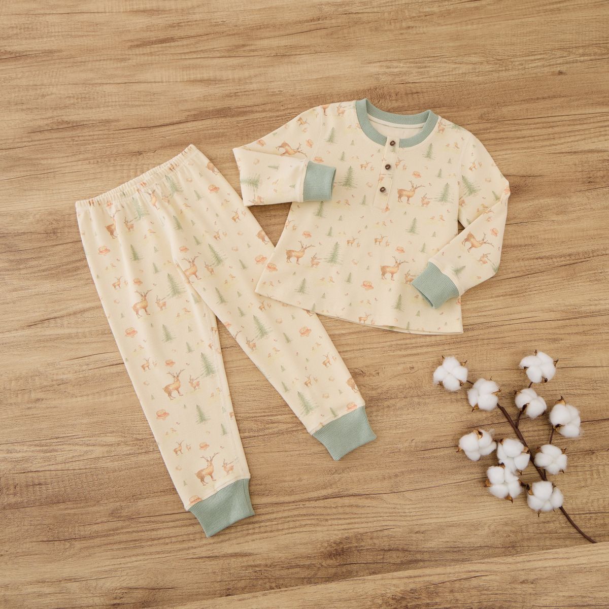 organic ribbed henley pajama set featuring cozy top and pants with playful deer print.