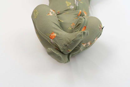 Forest friends footed zipper sleeper showing adorable animal prints on soft olive-green fabric.