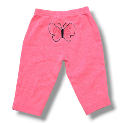 Preloved baby pants in soft pink with embroidered butterfly detail on the back, size 0-3 months.