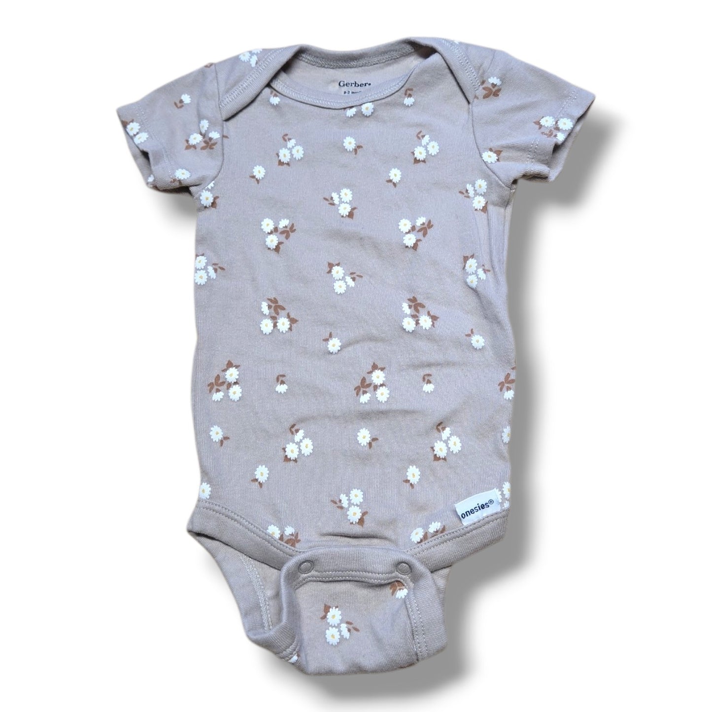 Gerber pre-loved baby onesie with floral print, perfect for layering and everyday wear.