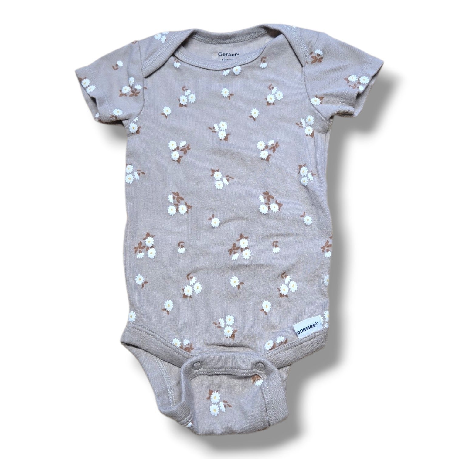 Gerber pre-loved baby onesie with floral print, perfect for layering and everyday wear.