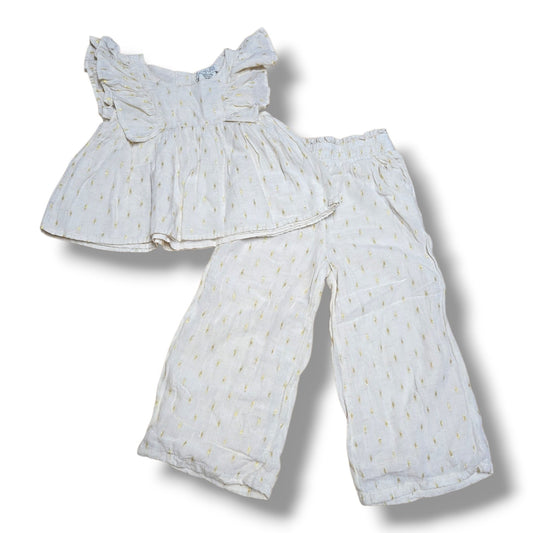 Pre-loved Rachel Zoe 4T set featuring a top and pants in light fabric with subtle patterns.