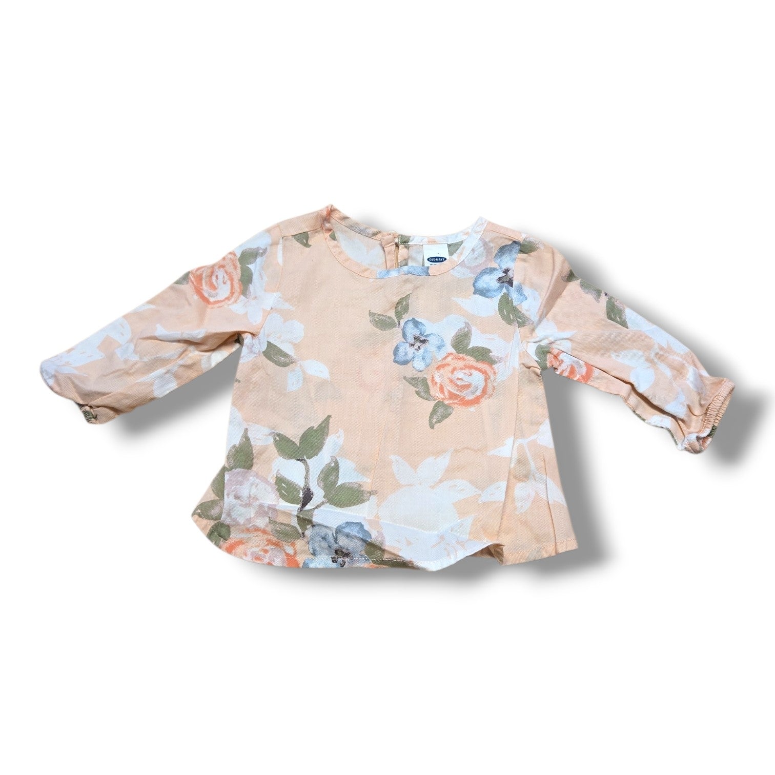 Old Navy pre-loved baby blouse 3-6 months in soft peach floral print with long sleeves and button closure.