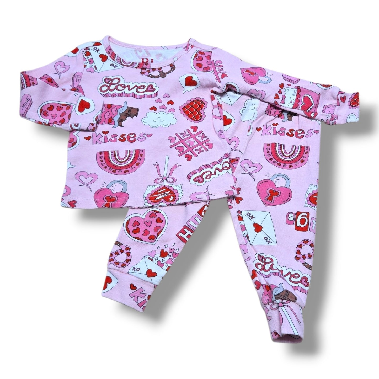 Children's Place 2PC pajama set in pink with Valentine's print, perfect for cozy playdates, pre-loved baby pajama set.