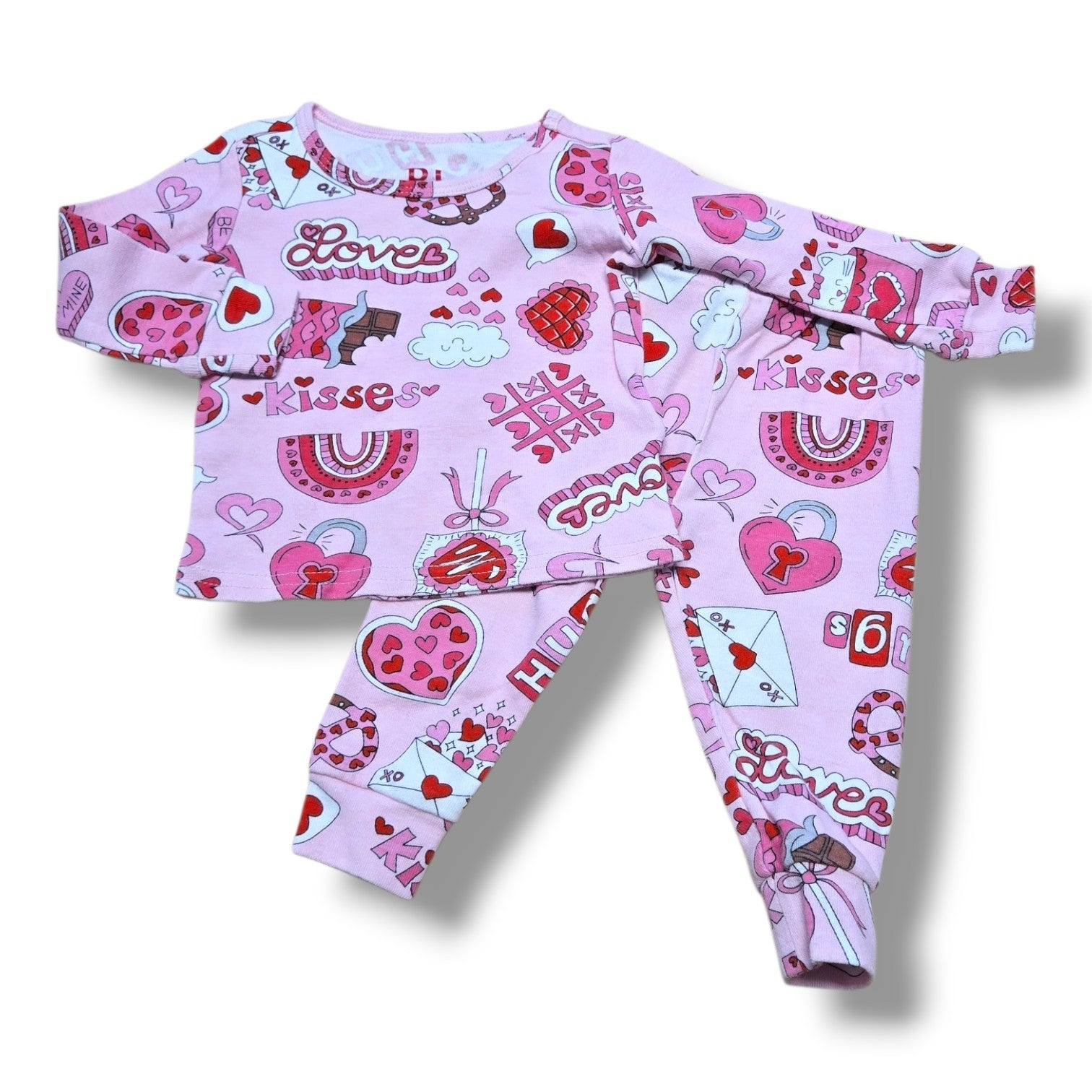 Children's Place 2PC pajama set in pink with Valentine's print, perfect for cozy playdates, pre-loved baby pajama set.