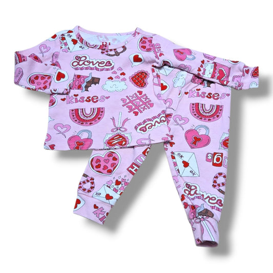 Children's Place 2PC pajama set in pink with Valentine's print, perfect for cozy playdates, pre-loved baby pajama set.