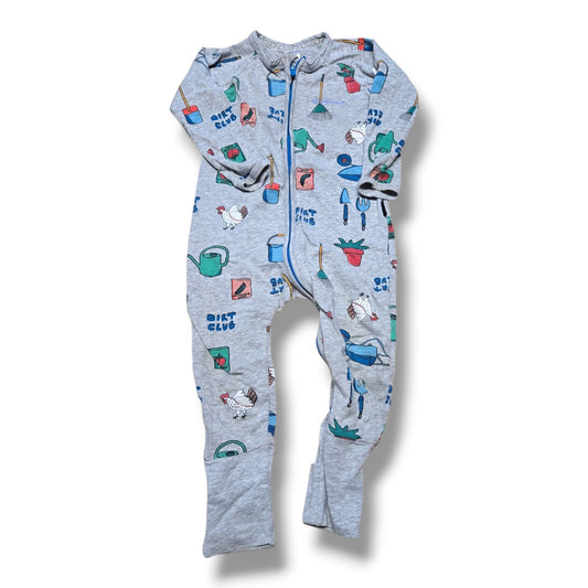 Children's grey onesie featuring colorful gardening-themed prints and a zip closure.