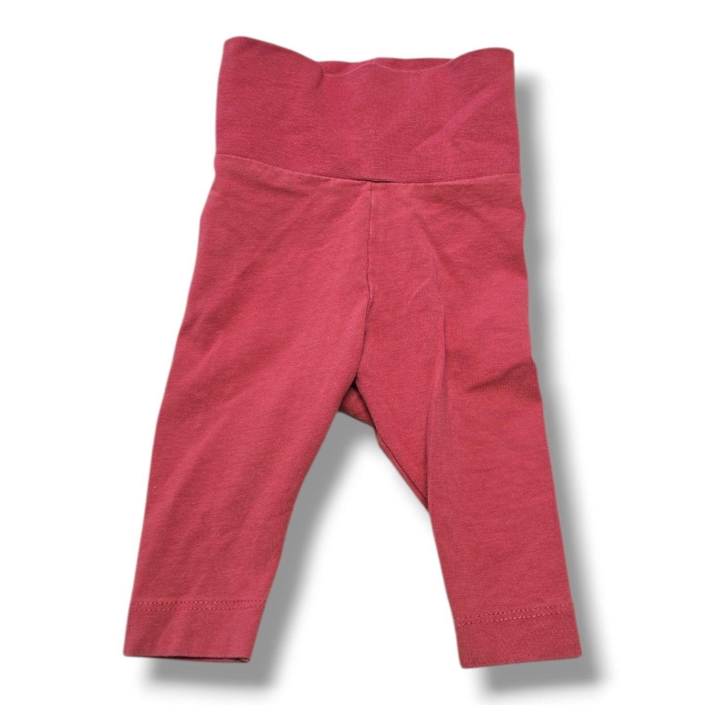 Preloved baby pants H&M in size 0-1M, soft knit with wide fold-over waistband, mint condition.