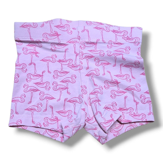 Preloved quality baby shorts in light purple with pink flamingo pattern, perfect for playtime and layering.