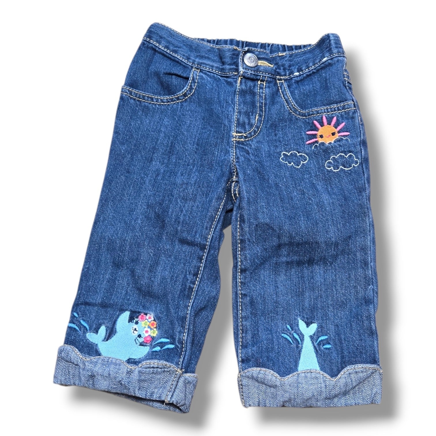Pre-loved Gymboree jeans 2T featuring embroidered ocean details, perfect for everyday adventures.
