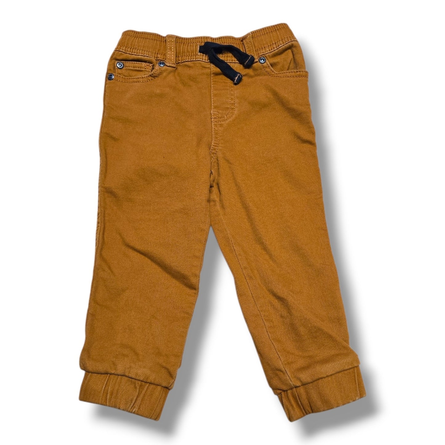 Soft camel brown Joe Fresh pre-loved jogger pants with elastic waistband and ribbed cuffs.