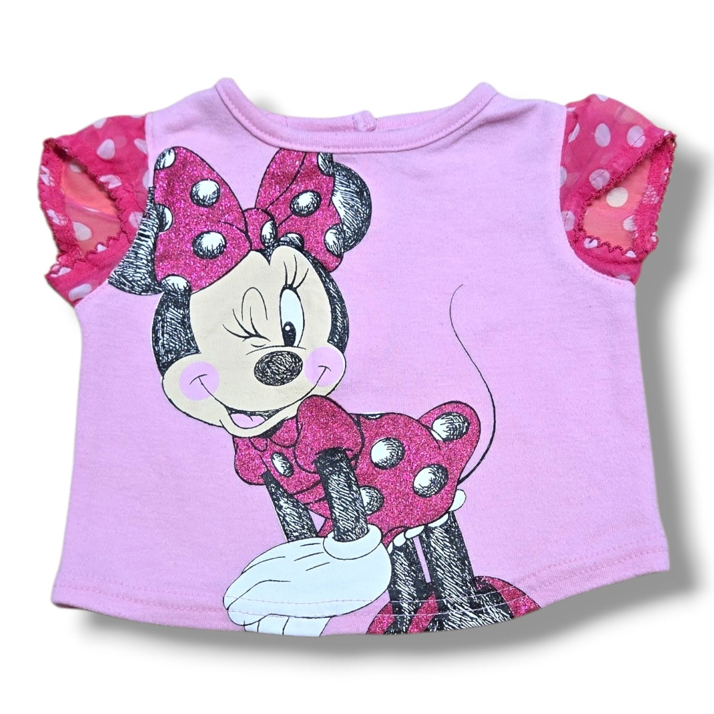 Disney baby Minnie Mouse t-shirt in soft pink with glittery graphic and polka dot flutter sleeves.