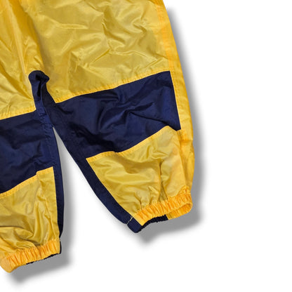 pre-loved Tuffo waterproof rainsuit in yellow and navy, perfect for outdoor adventures and rainy days.