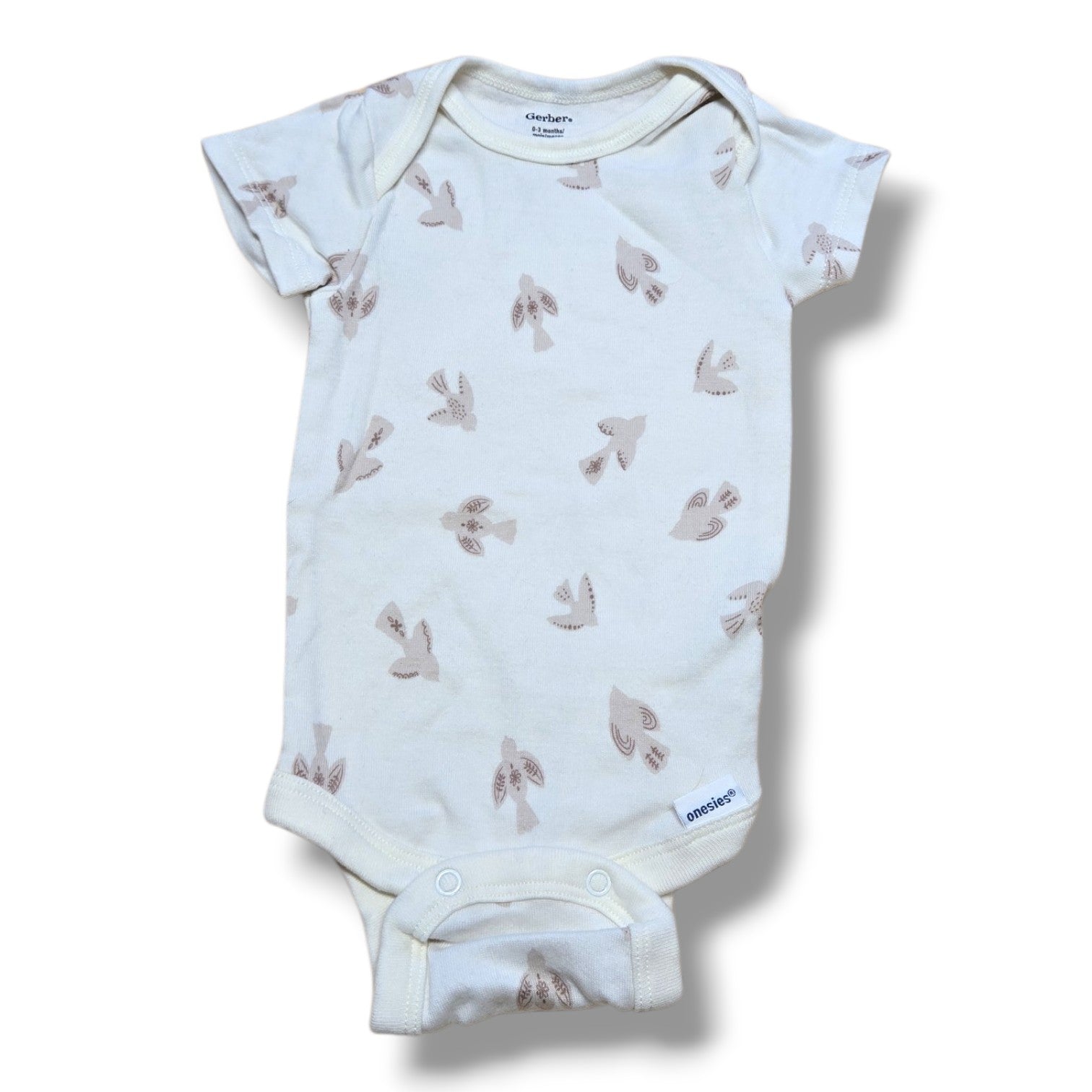 Gerber 0/3M pre-loved baby onesie with soft fabric and cute print, perfect for everyday wear.