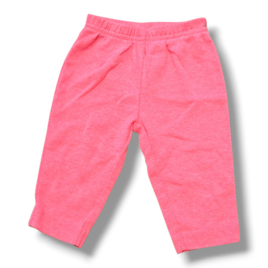 Soft pink knitted preloved baby pants for infants in size 0-3 months with comfortable elastic waistband.