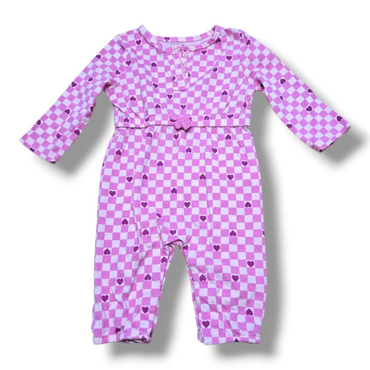 Pre-loved baby romper 3-6 months in pink checkerboard print with heart details and waist bow.