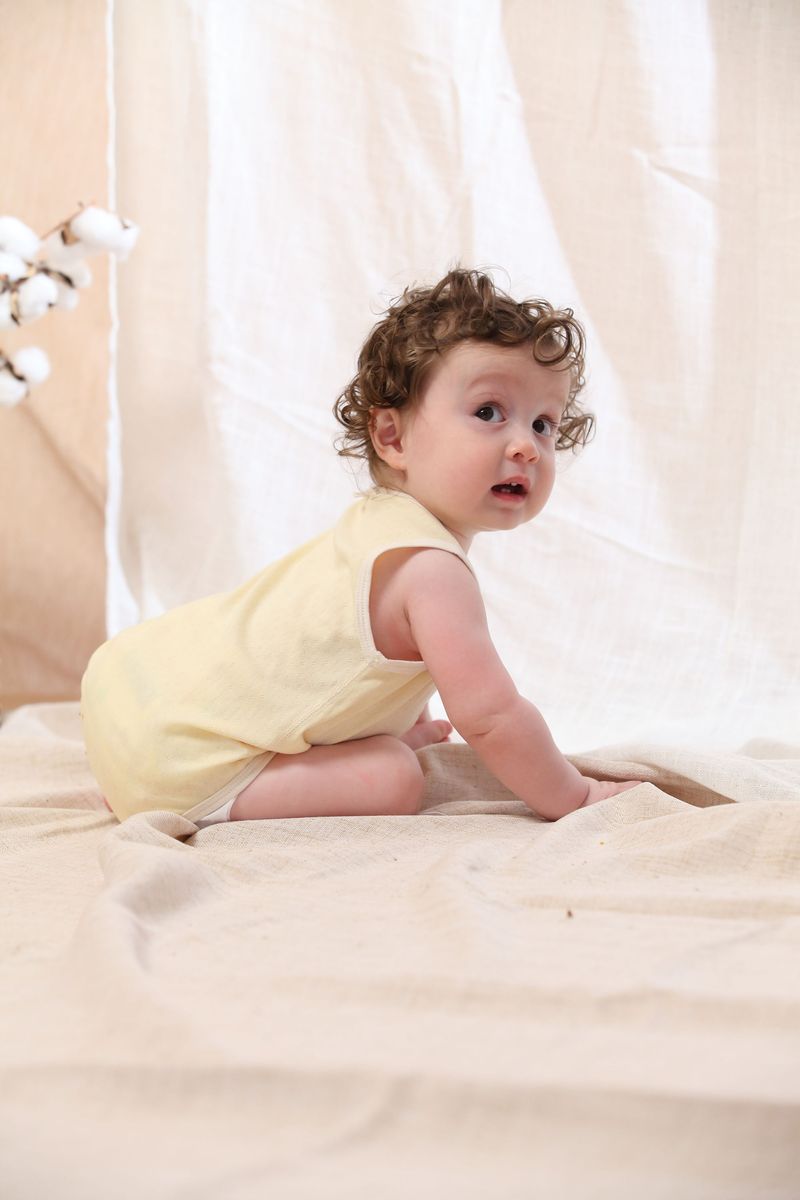 Blara Organic House | Sleeveless Henley Bodysuit | Creamy Yellow