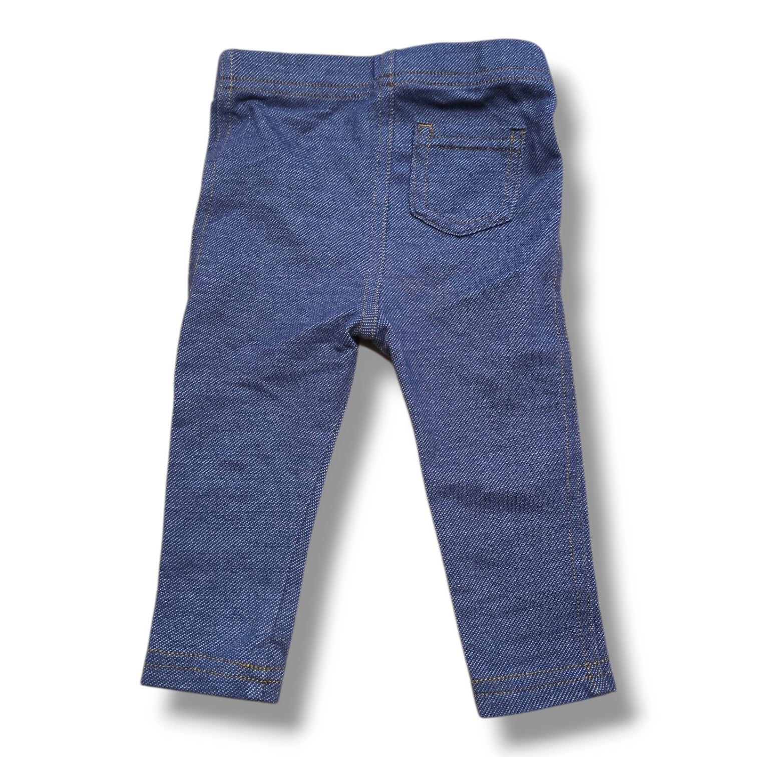 Joe Fresh pre-loved baby jeggings in size 3-6 months, soft stretchy denim-look fabric, mint condition.
