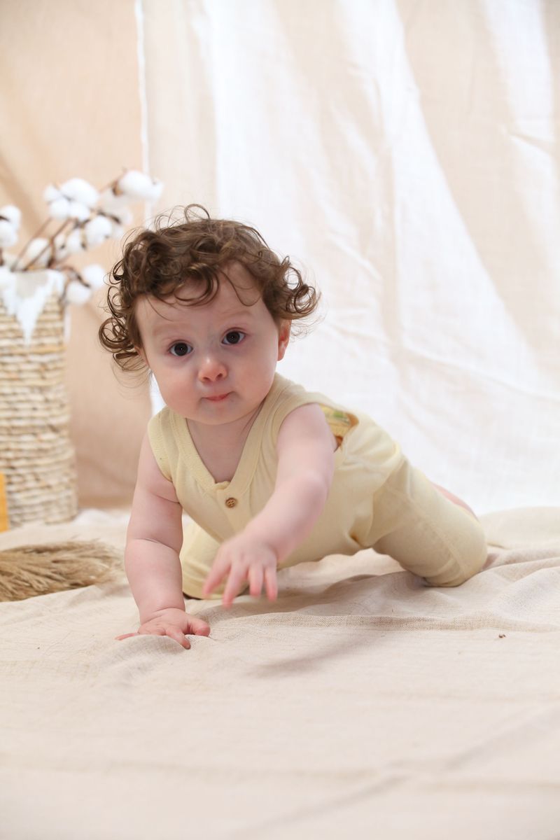 Coming Soon | Blara Organic House | Sleeveless Henley Romper | Creamy Yellow