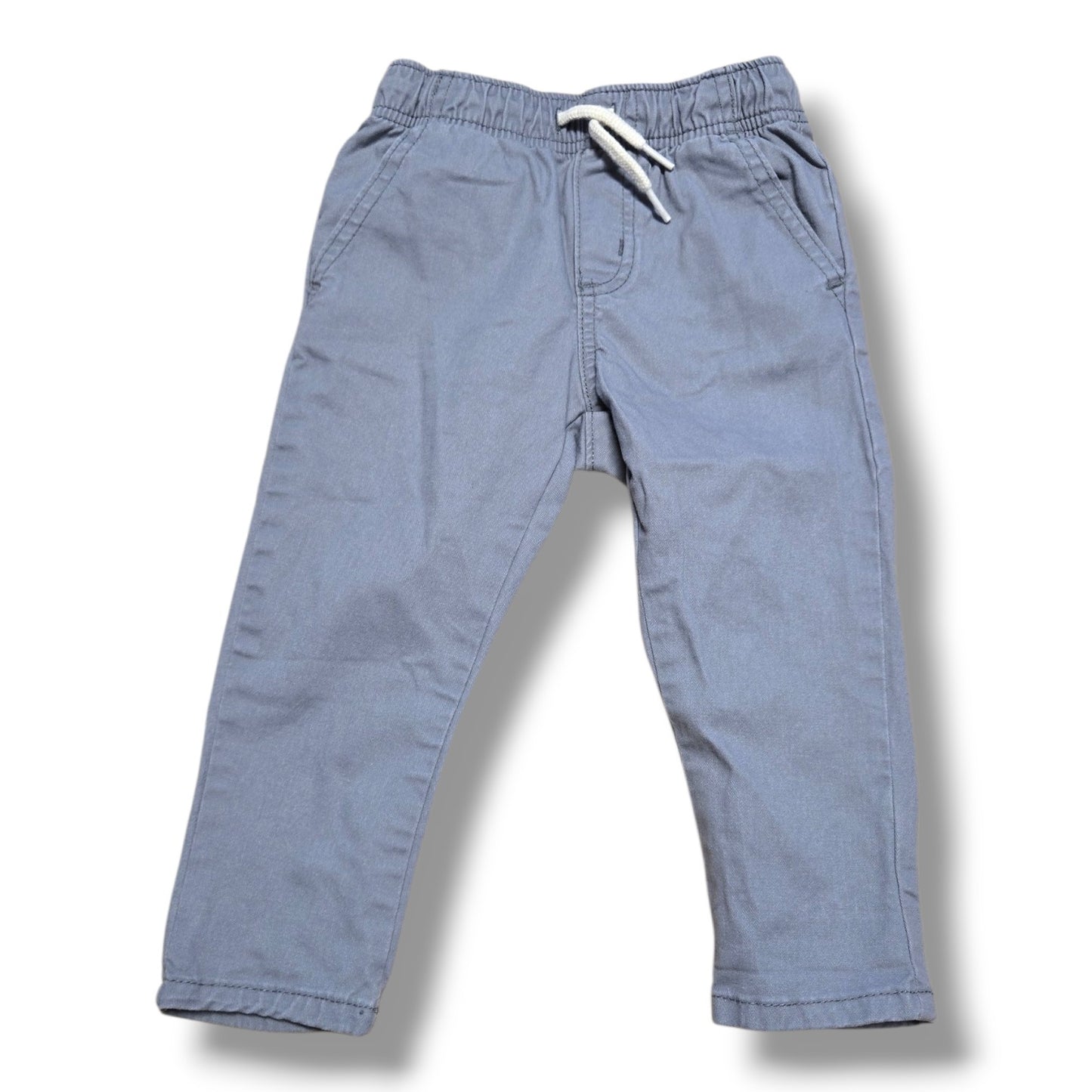 Pre-loved Old Navy toddler pants in size 12-18M with elastic waistband and front pockets.