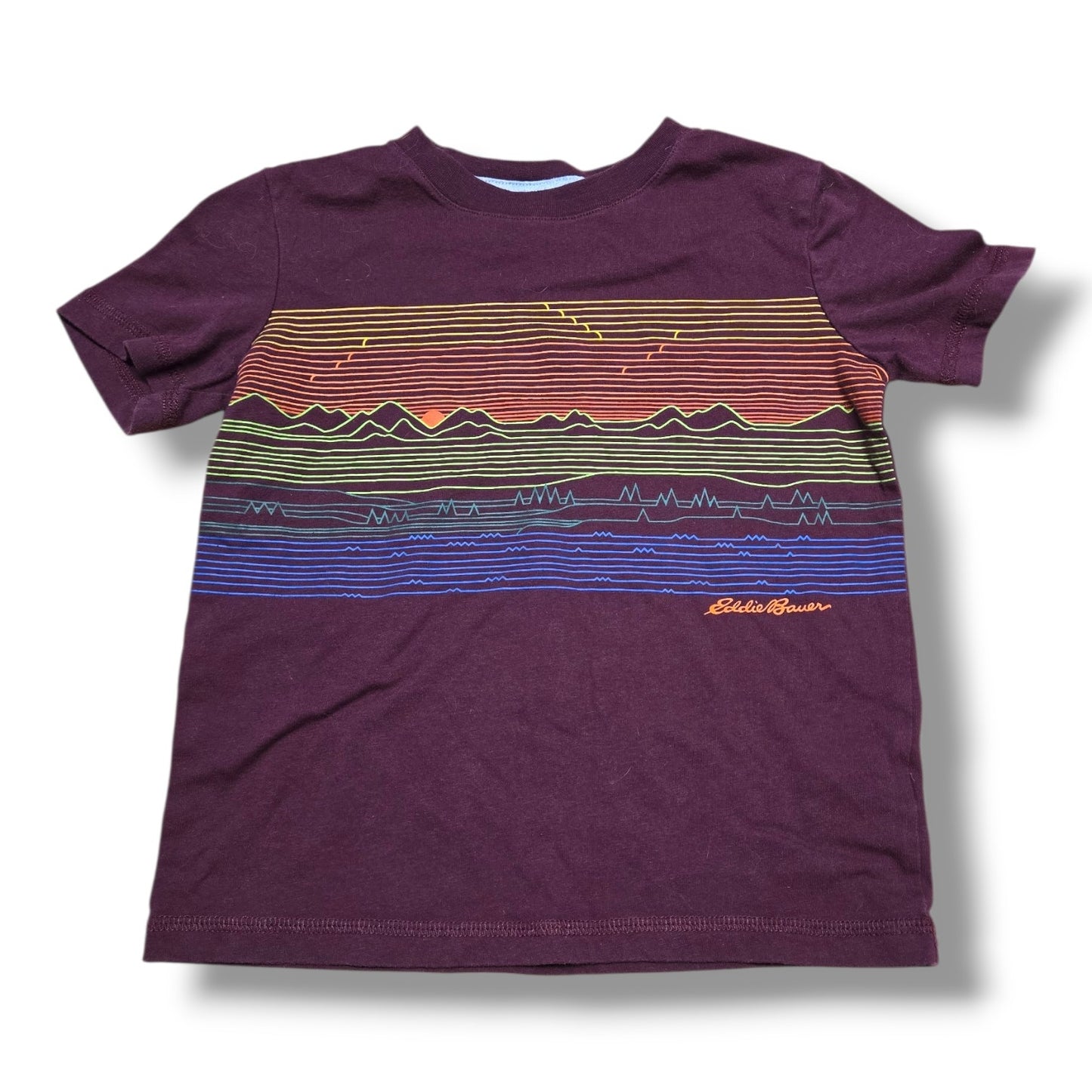 Pre-loved Eddie Bauer graphic tee featuring a colorful mountain design on a burgundy shirt for kids.