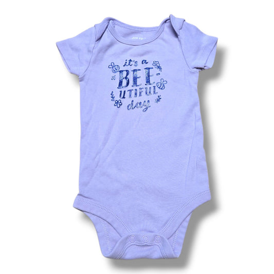 Joe Fresh pre-loved baby onesie in lilac with cute 'it's a bee-utiful day' print, perfect for casual wear.