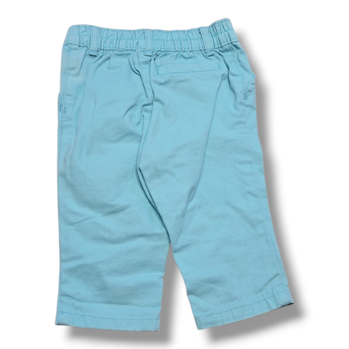 Preloved toddler pants 3-6 months, soft aqua woven pants with elastic waistband and pockets for comfort.