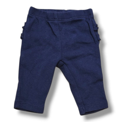Carter's newborn ruffle pants in soft navy with ruffle details, preloved quality, perfect for your little one.