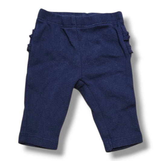 Carter's newborn ruffle pants in soft navy with ruffle details, preloved quality, perfect for your little one.