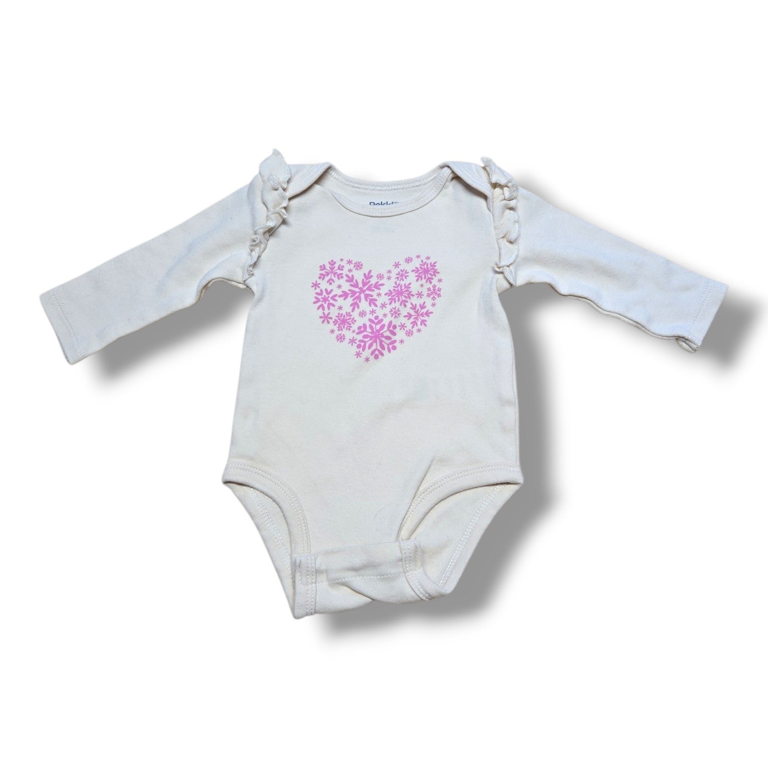 Preloved baby onesie with pink heart design and ruffle sleeves, perfect for everyday wear.