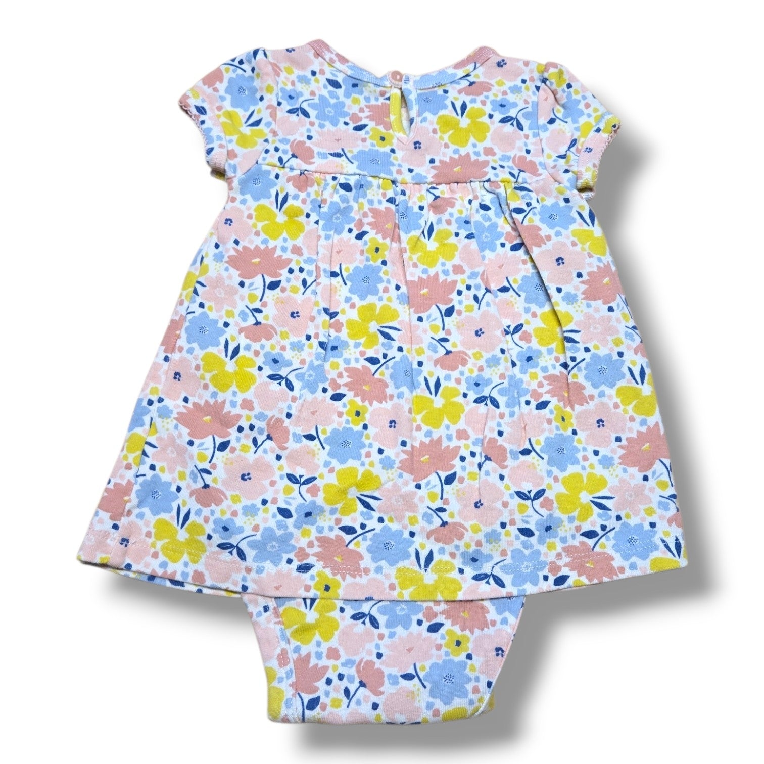 Pre-loved floral romper 3-6 months with pastel pink, yellow and blue floral print and bow detail.