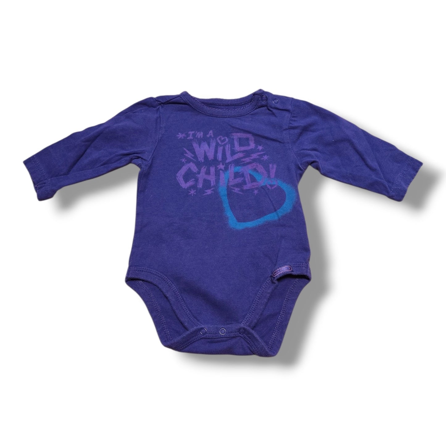 Pre-loved children's onesie in purple with 'I'm a Wild Child' print, perfect for everyday adventures.