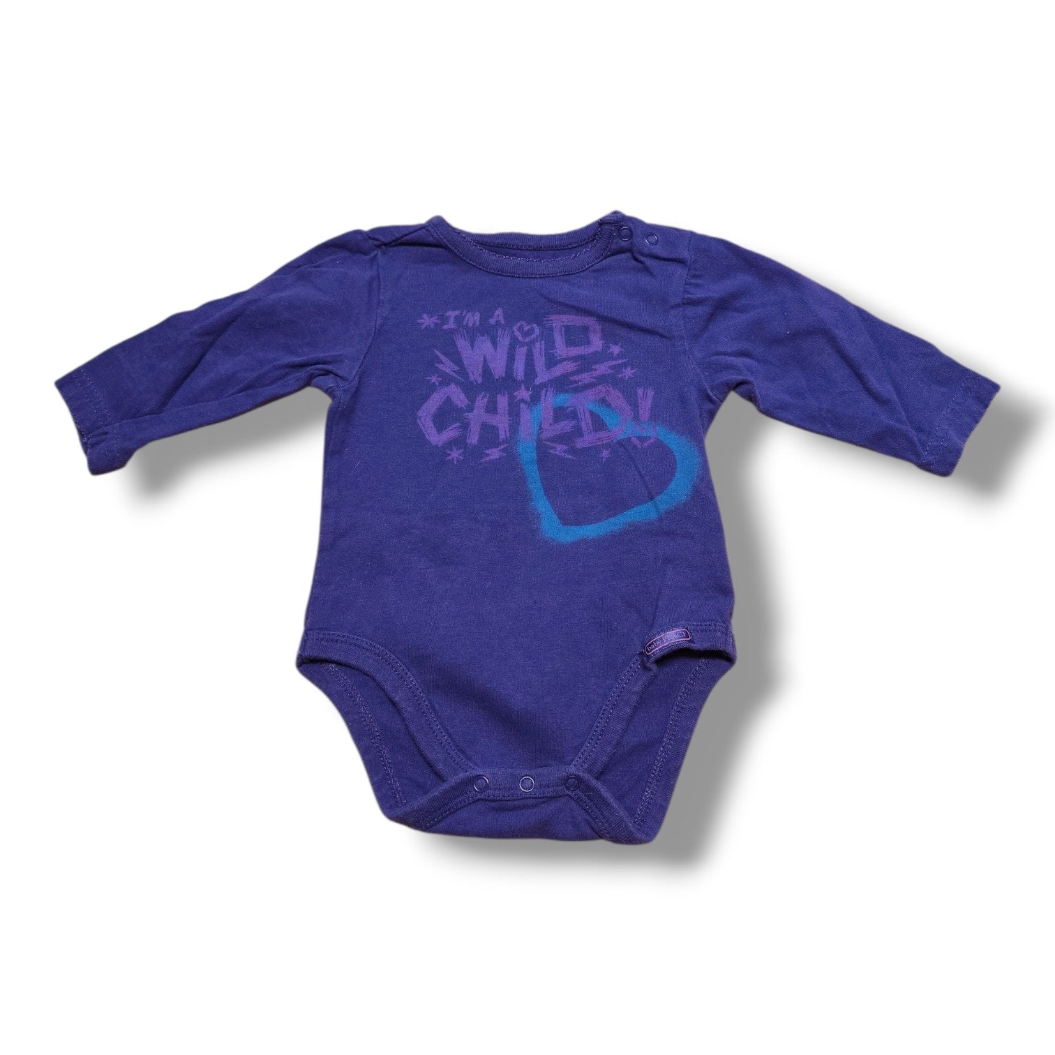 Pre-loved children's onesie in purple with 'I'm a Wild Child' print, perfect for everyday adventures.