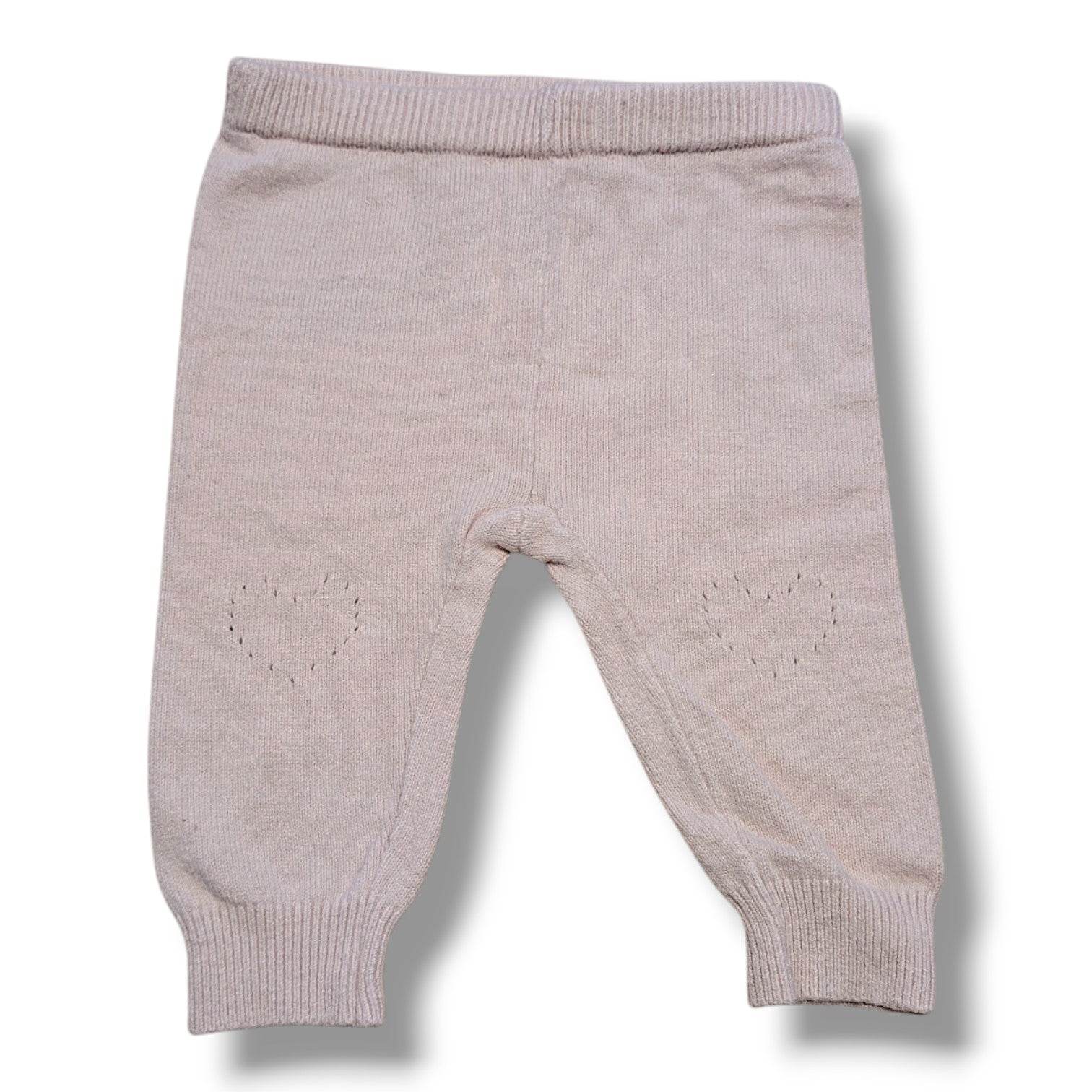 Pre-loved knit leggings for babies in size 0-3M with heart details on knees, mint condition.